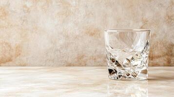 A glass of water on a table photo