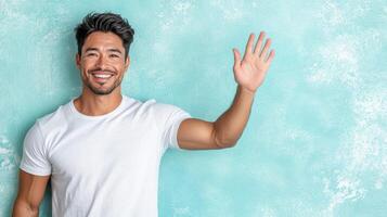 A man is waving his hand in the air photo