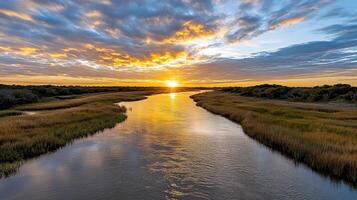 Sunset over the marsh at the end of the day photo