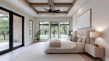A bedroom with a ceiling fan and sliding glass doors photo