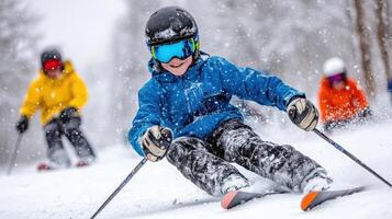 A young boy skiing down a snowy slope photo
