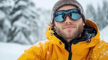 A man in a yellow jacket and sunglasses is taking a selfie photo