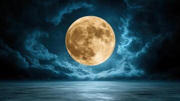 A full moon is seen in the sky over a dark ocean photo