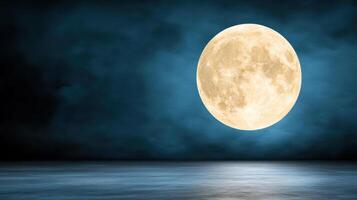 A full moon is seen in the dark photo