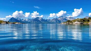 A beautiful view of the mountains and water photo