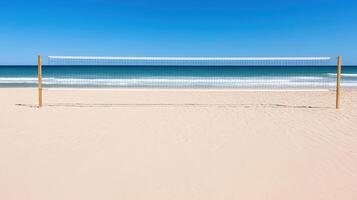 A volleyball net on the beach with the ocean in the background photo