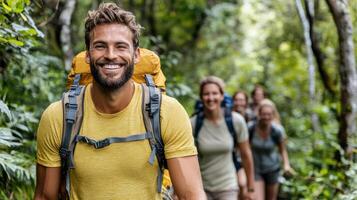 A group of people hiking in the woods photo