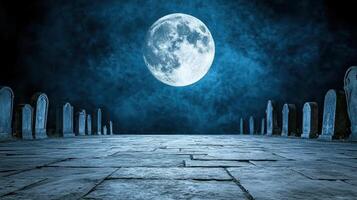 A full moon is seen in the sky over a cemetery photo