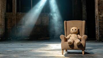 A teddy bear sitting in an old chair photo