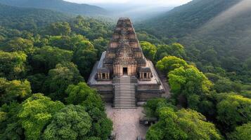 An aerial view of a temple in the middle of a forest photo