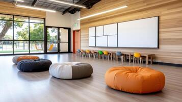 A classroom with bean bags and wooden walls photo