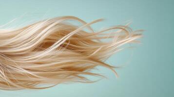 A woman's hair is blowing in the wind photo