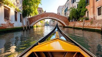 A gondola is traveling down a canal in venice photo