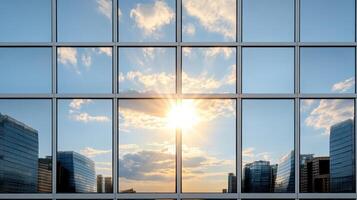A view of the sun shining through the windows of a building photo