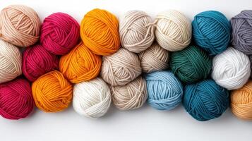 A group of yarn balls arranged in a row photo