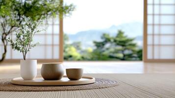 A table with two cups and a plant on it photo