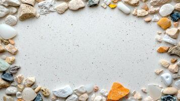 A circle of rocks and pebbles on a white surface photo