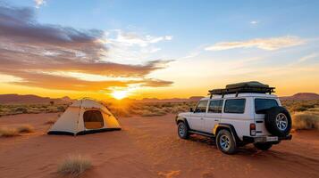 A white suv parked in the desert with a tent photo