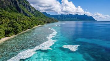 A beautiful beach with clear water and mountains photo