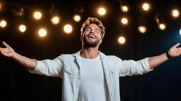 A man is singing in front of lights photo