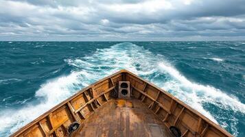 A view of the bow of a boat in the ocean photo