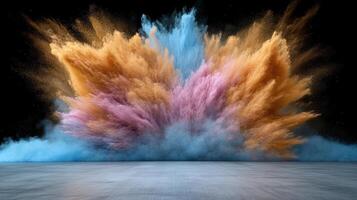 Colorful explosion of colored powder on a black floor photo