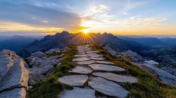 A path leading up to the mountains at sunset photo