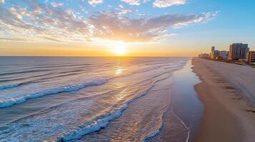 Sunset over the ocean and beach in myrtle beach, sc photo