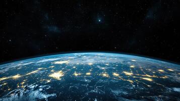 The earth from space with lights and stars photo