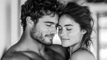 A man and woman are embracing each other photo