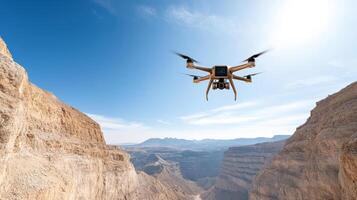 A drone flying over a canyon with a mountain in the background photo