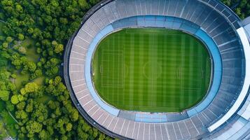 An aerial view of a soccer stadium with grass photo