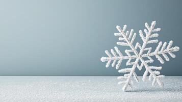 A snowflake on a blue background photo