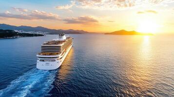 Cruise ship sailing in the ocean at sunset photo