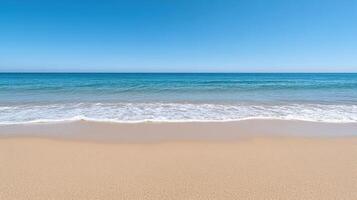 A beach with a blue sky and a wave photo