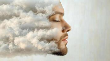 A man with his face covered in clouds photo