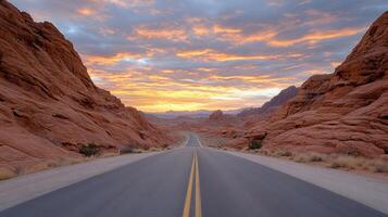 A long empty road in the desert photo