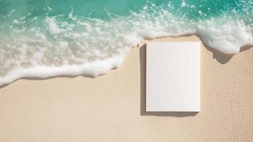 An empty white card on the beach with waves photo