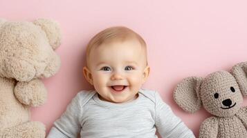 A baby is smiling next to a teddy bear photo