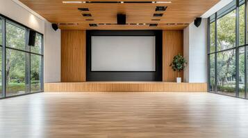 Empty room with wooden floor and large windows photo