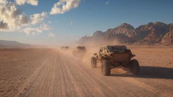 Four off road vehicles driving through the desert photo