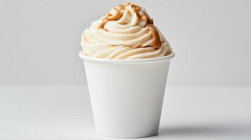 A cup of ice cream with caramel sauce on top photo