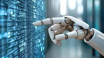 A robot hand pointing at a computer screen photo