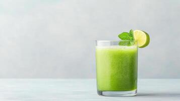 A green smoothie with lime and mint photo