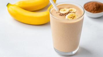 A smoothie with bananas and chocolate chips photo