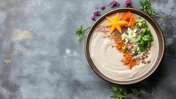 Dairy-free vegan hummus with vegetables and herbs on a dark background photo