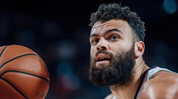A man with a beard and a basketball ball photo