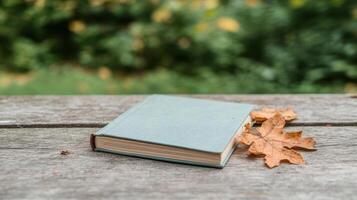 Autumn leaves on a wooden table photo