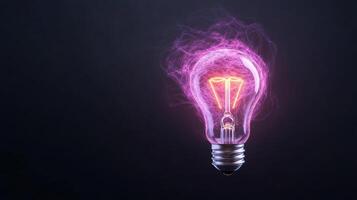 A light bulb with glowing pink smoke coming out of it photo