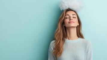Beautiful young woman with cloud on head and eyes closed photo